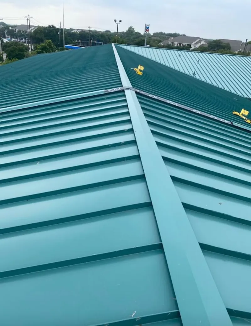 Green commercial metal roof ridge and valley for Metal Roof Repair in Antelope